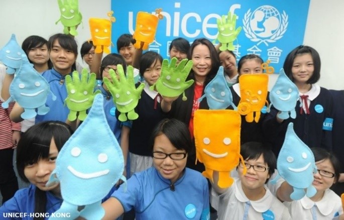 Group holding Global Handwashing Partnership puppets