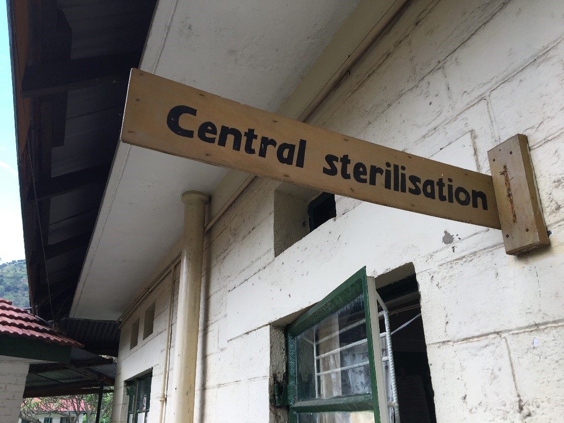 Sign at Ugandan health care facility points to "Central sterilisation"