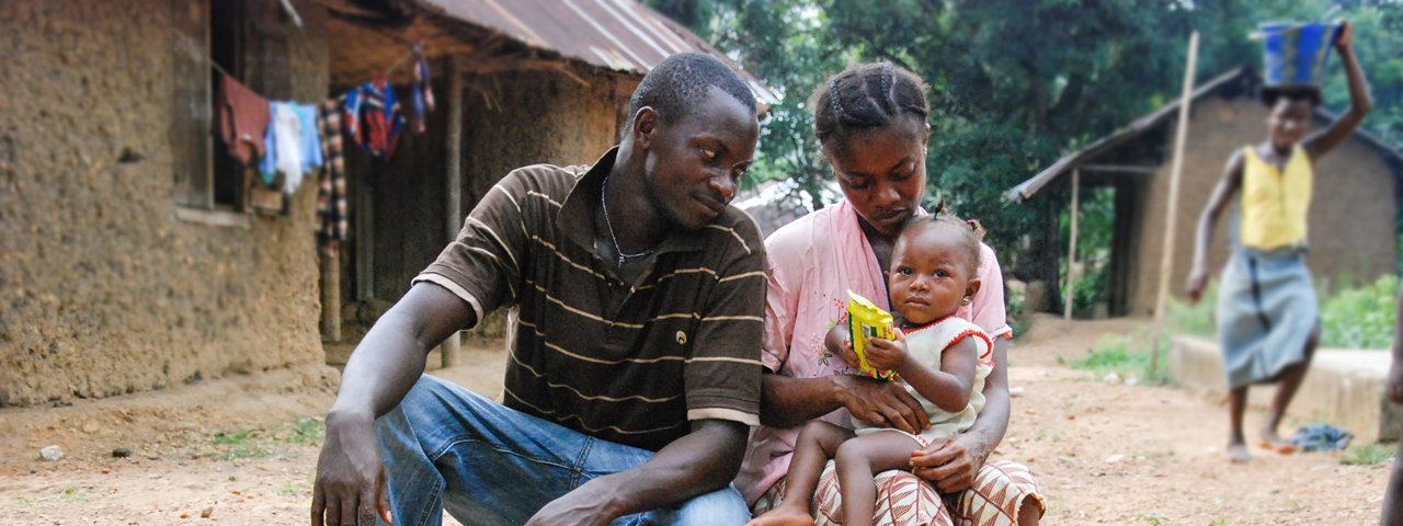 Father, mother, and infant girl in Sierra Leone