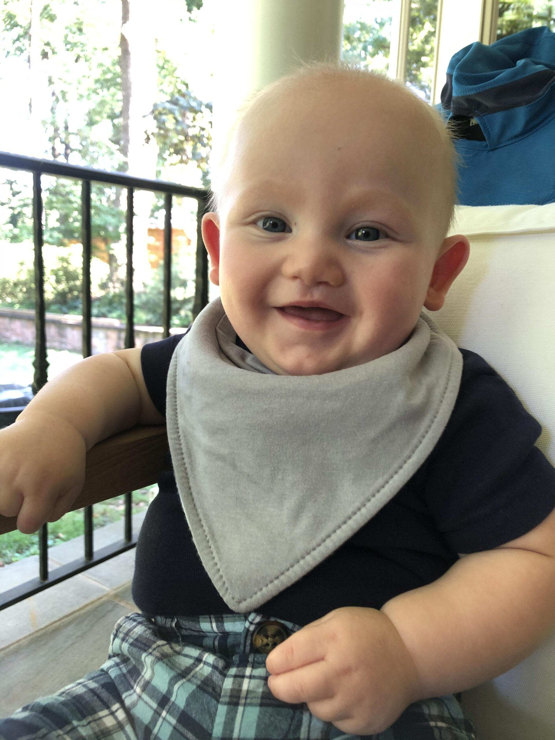 Miles Kallen smiling at 6 months of age