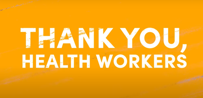 Text on an orange background reads: "THANK YOU, HEALTH WORKERS" in bold white letters. The text is centered, and the background has a slight texture.