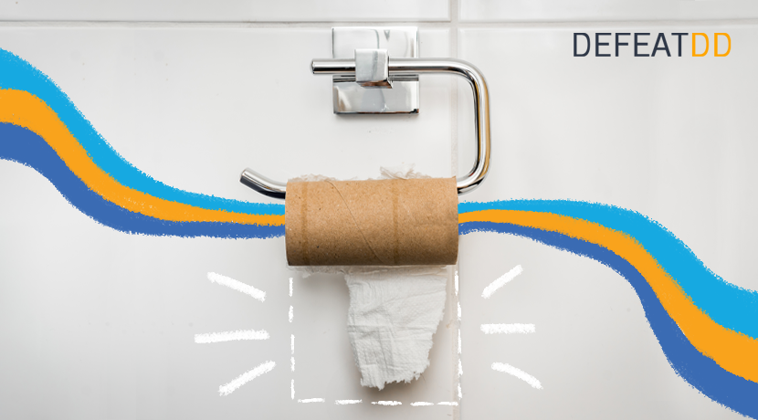 Toilet paper roll without paper left on a metallic holder, depicted with blue and orange streaks extending from each side. "DEFEATDD" is written in the top right corner against a white tiled wall. White graphic lines emphasize the empty roll.