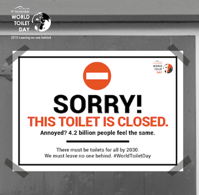 A sign on a closed toilet door reads: "SORRY! THIS TOILET IS CLOSED. Annoyed? 4.2 billion people feel the same." It highlights the message for World Toilet Day, emphasizing the need for access to toilets for all by 2030.